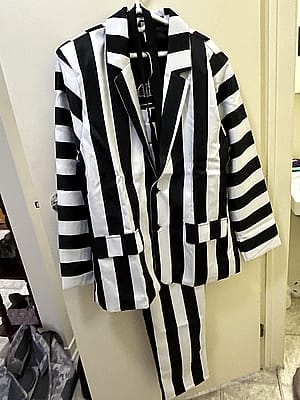 Hi, I’m Basil. Does anyone have any advice for making this Beetlejuice costume look dirty and tattered without using actual dirt?'